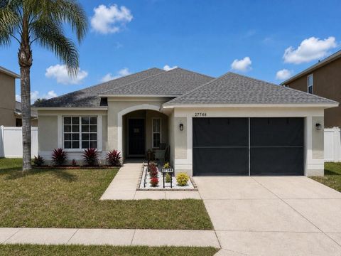 Photo of 27748 Sugar Loaf Drive, Wesley Chapel, FL 33544 (MLS # TB8503778)