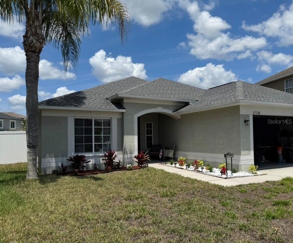 Photo of 27748 Sugar Loaf Drive, Wesley Chapel, FL 33544 (MLS # TB8503778)