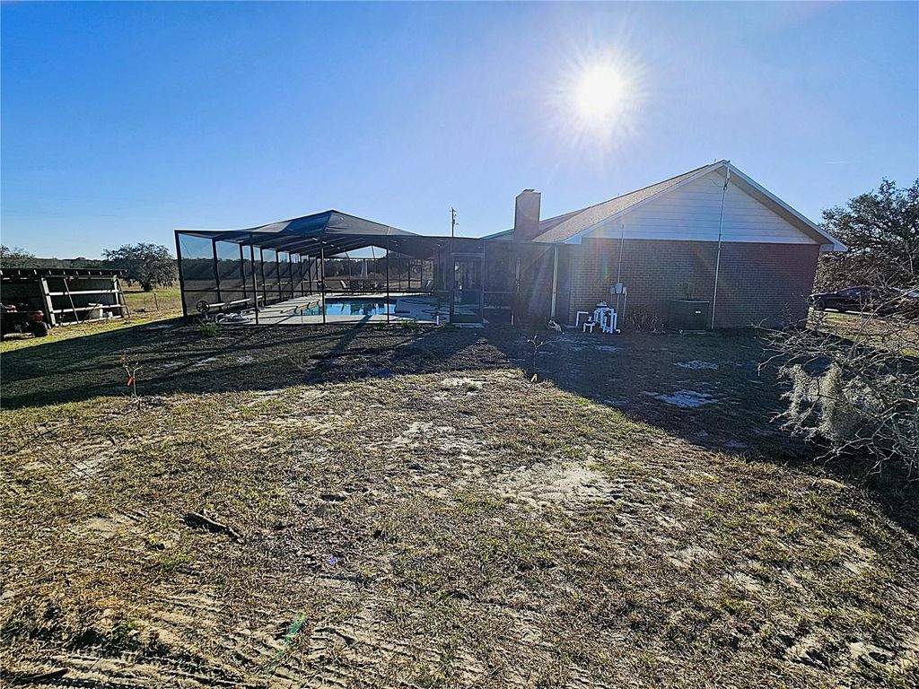 Photo of 13308 Duck Lake Canal Road, Dade City, FL 33525 (MLS # TB8475916)