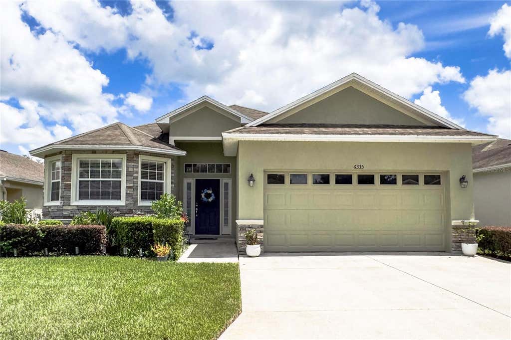 Photo of 6335 Silver Leaf Lane, Lakeland, FL 33813 (MLS # O6435399)