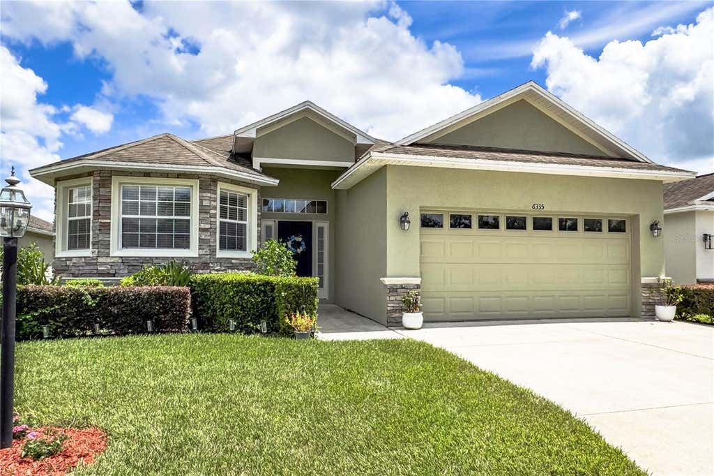Photo of 6335 Silver Leaf Lane, Lakeland, FL 33813 (MLS # O6435399)