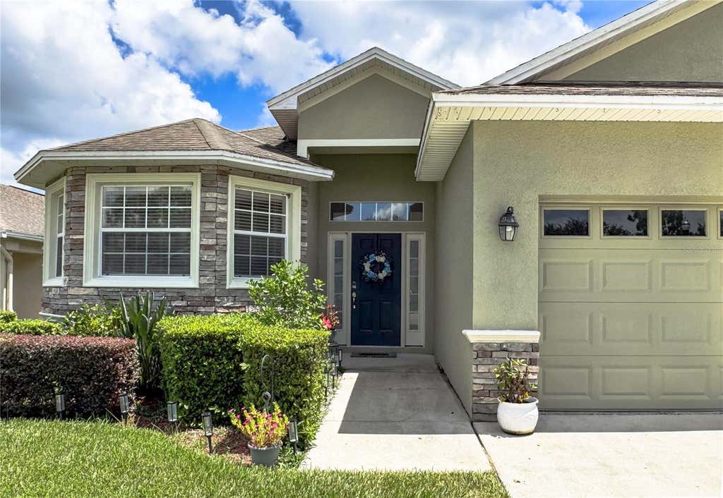 Photo of 6335 Silver Leaf Lane, Lakeland, FL 33813 (MLS # O6435399)