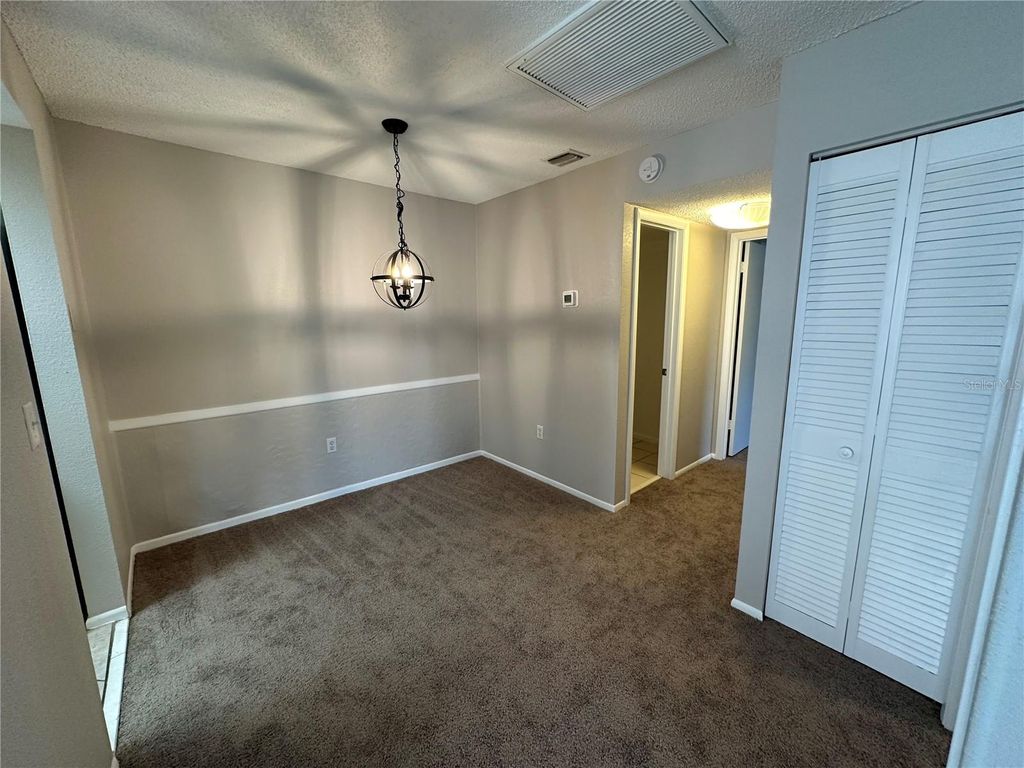 Photo of 6020 Village Circle #6020, Orlando, FL 32822 (MLS # O6395932)