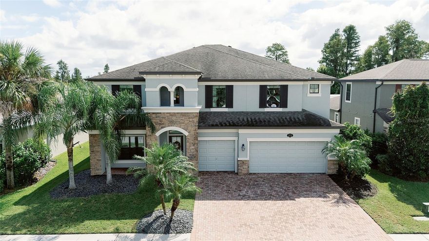 **Priced to Sell, One of the lowest if not the lowest price per square foot in LLR** Welcome to this spacious MI Homes Windsor model in the desirable Long Lake Ranch community of Lutz. Offering 4,242 sq ft of living space, this home features 5 bedrooms, 3.5 bathrooms, and a 3-car garage, designed with both comfort and style in mind. Interior Features. Expansive open floor plan with high ceilings and natural light. Chef’s kitchen with quartz countertops, oversized island, stainless steel appliances, and walk-in pantry. Large  room with seamless flow to dining area—ideal for entertaining. Primary suite with spa-inspired bathroom, dual vanities, soaking tub, walk-in shower, and huge closet. Oversized media room best suited for gatherings or game nights. Luxury flooring and modern finishes throughout Exterior Features. Lot is located next to conservation area for privacy. Spacious backyard with room for a pool or outdoor living space. Covered lanai for year-round enjoyment. Beautiful curb appeal and oversized driveway Community & Location. Situated in Long Lake Ranch, known for resort-style amenities including pool, clubhouse, playgrounds, tennis courts. Convenient access to shopping, dining, schools, and major highways. Just a short drive to downtown Tampa, beaches, and Tampa International Airport