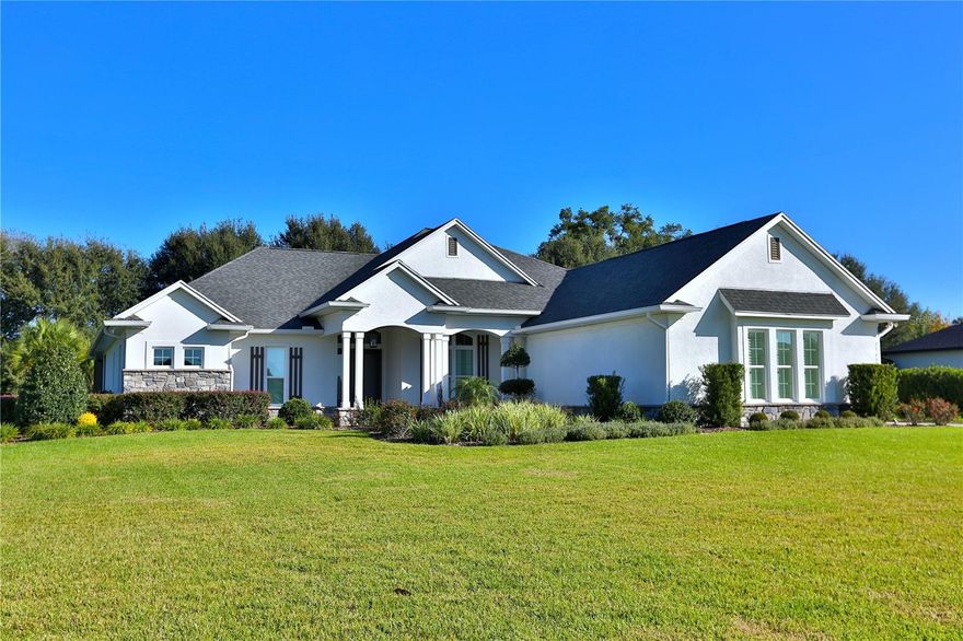 Welcome to this prestigious and impeccable 4 bedroom, 3 bath home encompassing 2,700 +/- square feet with stunning natural light.  It's balanced and grand yet warm and inviting, perfect for entertaining.   The entry foyer invites you into an open great room, dining room, and Chef's kitchen. Gourmet kitchen featuring a center island, gas cooktop, GE Monogram appliances, double built-in ovens, plus 2 pantries of which one is a large custom walk-in pantry with workstation. The great room features sliding doors leading to an enclosed lanai, a summer kitchen, pool with a large deck, and plenty of seating areas, making it perfect for entertaining.  Master suite with luxurious bath with dual vanities, free-standing tub and large walk-in closet.  Additional features include a Generac generator, irrigation system,  RO water system, water softener system, and custom garage storage system.    Legendary Trails is a gated community near the Santos Trail Head for hiking and biking entertainment.