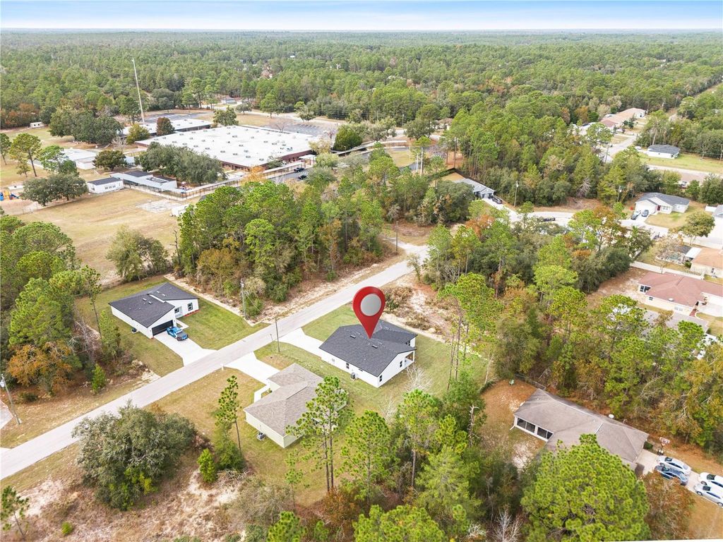 Photo of 8017 N Maltese Dr, Citrus Springs, FL 34433 (MLS # O6363736)