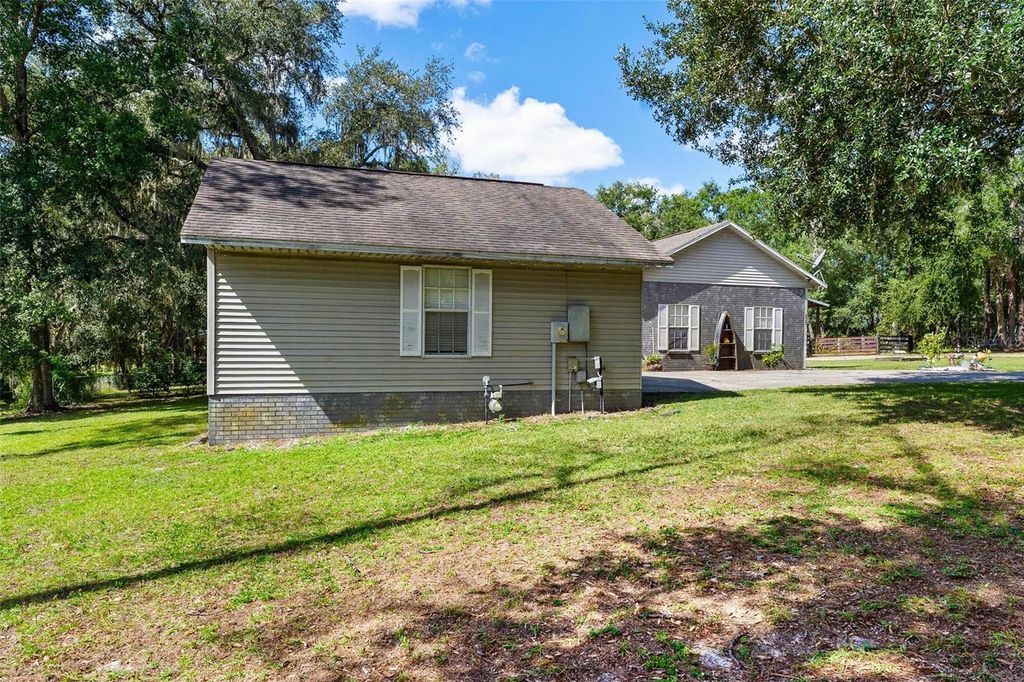 Photo of 36301 Piney Ridge Boulevard, Fruitland Park, FL 34731 (MLS # G5102726)
