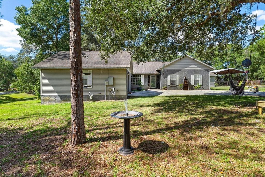 Photo of 36301 Piney Ridge Boulevard, Fruitland Park, FL 34731 (MLS # G5102726)