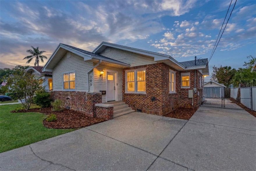 Nestled on a charming, well-kept street in the heart of Seminole Heights, this immaculately maintained home at 305 W Frierson offers timeless character paired with thoughtful modern updates, just moments from the scenic Hillsborough River at the end of the street. Quiet inside and rich with over 100 years of character, this 3-bedroom, 2-bath residence has been proudly owned and meticulously cared for by the same owner for 22 years. Inside, you’ll find gorgeous hardwood floors, tall ceilings, and an abundance of large windows that flood the home with natural light. The fully functioning fireplace, framed by original built-ins, creates a cozy yet classic focal point in the living space. The layout is both functional and flexible, featuring a third bedroom just off the living room, perfect for a home office, creative space, or guest room. The home offers both a formal dining room and a charming eat-in nook just off the kitchen, while the spacious, open kitchen provides plenty of room to cook, gather, and entertain, complete with brand-new appliances including the refrigerator, stove, microwave, and dishwasher (March 2026). For added convenience, the laundry room is located just off the primary bedroom, and both bathrooms are equipped with heat and fan systems for additional comfort. Step outside to enjoy a fully fenced yard with exceptional parking options in both the front and backyard, much more than other homes in the area, along with a detached one-car garage and an oversized driveway. Major updates provide peace of mind for years to come, including a new roof (January 2026), a new A/C system (October 2024) with a transferable warranty, water heater (2021), termite tenting completed in November 2025 with a transferable warranty, fresh paint completed in November 2025, new carpeting installed in January 2026, new light fixtures and ceiling fans added in 2026, and new outlets and wall switches installed in 2026. Additional features include an attic fan that helps efficiently cool the home during the summer months. This is a rare opportunity to own a beautifully preserved and thoughtfully updated home in one of Tampa’s most sought-after neighborhoods, just minutes from local dining, shops, and riverfront living. Need to move right in? You can even purchase the furniture too so all you have to bring is your bedroom furniture!