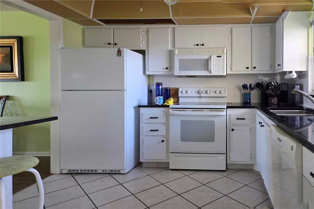 Photo of 4550 Cove Circle #406, St Petersburg, FL 33708 (MLS # TB8457353)