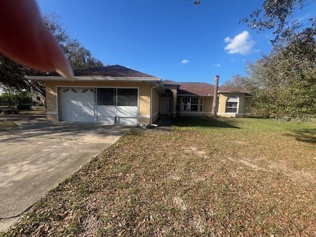 Photo of 3301 Hammock Grove Road, Groveland, FL 34736 (MLS # G5109437)
