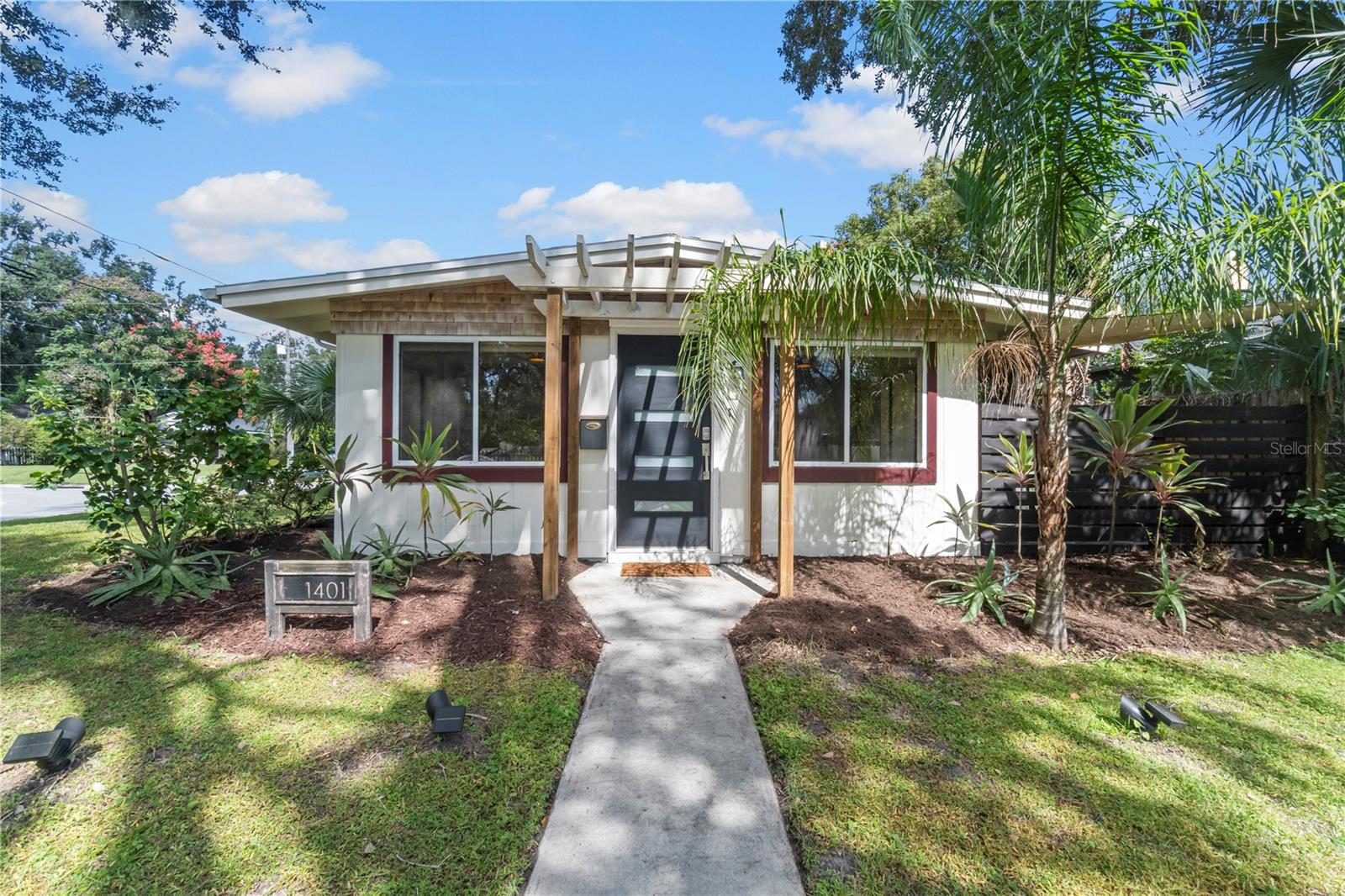 This 3 bedroom, 1 bathroom cottage offers a smart layout with great flow. Upon entry, walk right into the dining area, which connects to the living room and kitchen through an open eat-in bar. The kitchen features solid wood cabinetry, stone countertops, and modern appliances, with a convenient side entry from the open carport. All three bedrooms are located off a central hallway, along with a shared full bathroom.
Enjoy the outdoors with a covered patio and a manageable backyard, just the right size for a dog to play, without the upkeep of a large lot.
Located in a walkable neighborhood just minutes from downtown and the Curry Ford West district. After dinner, stroll over to Kelly's Ice Cream for a treat!