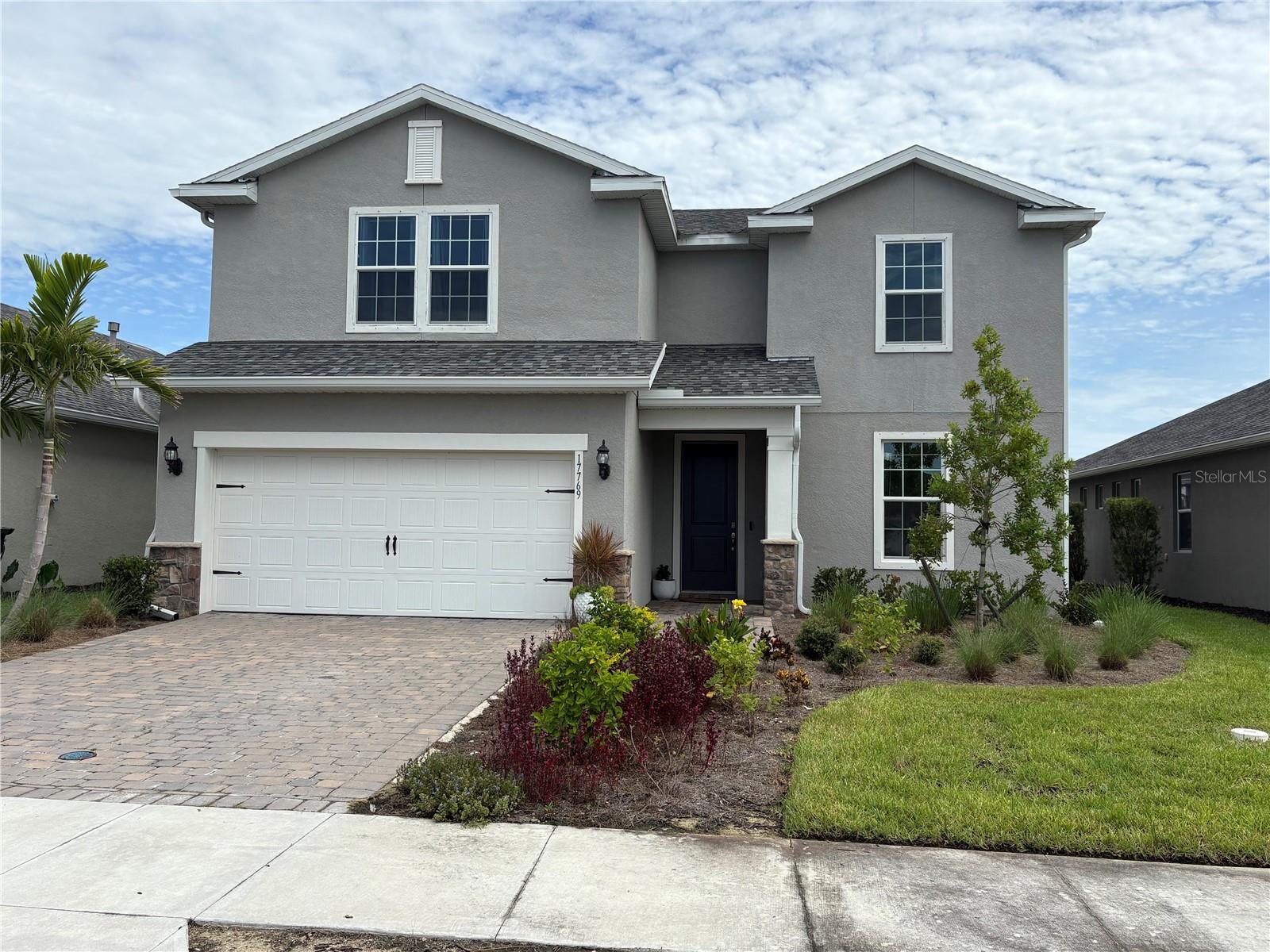 Beautiful 2 story 4 bedroom+den 3 1/2 bath home in wonderful Babcock Ranch in the Parkside subdivision. This home was completed in 2023. There is $90,000+ in upgrades in the home including the $15,000 lot premium, Quartz countertops, tile back splash, additional sliding glass door in the living area, covered extended lanai, kitchen island, 4 foot extended garage, back yard, washer and dryer included, appliances included with extra refrigerator in garage, epoxy floor in garage, aluminum fence and pre piped for outdoor kitchen and more. This very spacious home is ready for a growing family. Room for a pool and across from the trail entrance. Babcock Ranch is amenity rich with miles of biking and walking trails. From this home it is an easy walk to Founders Square. Publix is just a short drive or bike ride away.