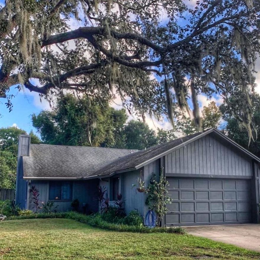 A MUST SEE! Beautiful home in the highly desirable and established Tymber Creek neighborhood. This home features new laminate flooring throughout the main living area and guest bedroom. Both the living area and master bedroom boast cathedral ceilings making the rooms feel extremely spacious. Each of the two bathrooms have been renovated. There is plenty of room for a hot tub on the back patio and lots of space for a garden. Just one street over is the neighborhood clubhouse, pool, tennis courts, basketball court, playground and a spring-fed pond for fishing and kayaking. And, as a bonus, there is a grapefruit tree in the common area that's accessible from the back yard. *owner is a Florida Licensed Real Estate Agent*