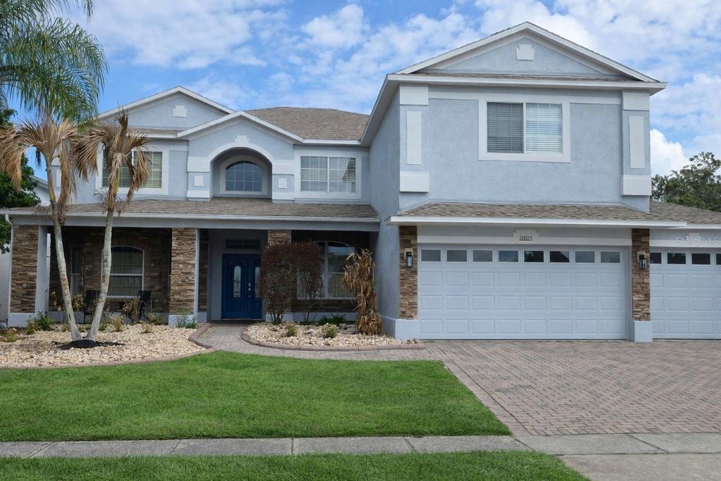 Photo of 10021 Hart Branch Circle, Orlando, FL 32832 (MLS # TB8487804)