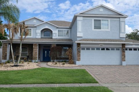 Photo of 10021 Hart Branch Circle, Orlando, FL 32832 (MLS # TB8487804)