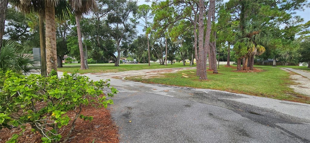 Photo of 11501 Walker Avenue, Seminole, FL 33772 (MLS # TB8544130)