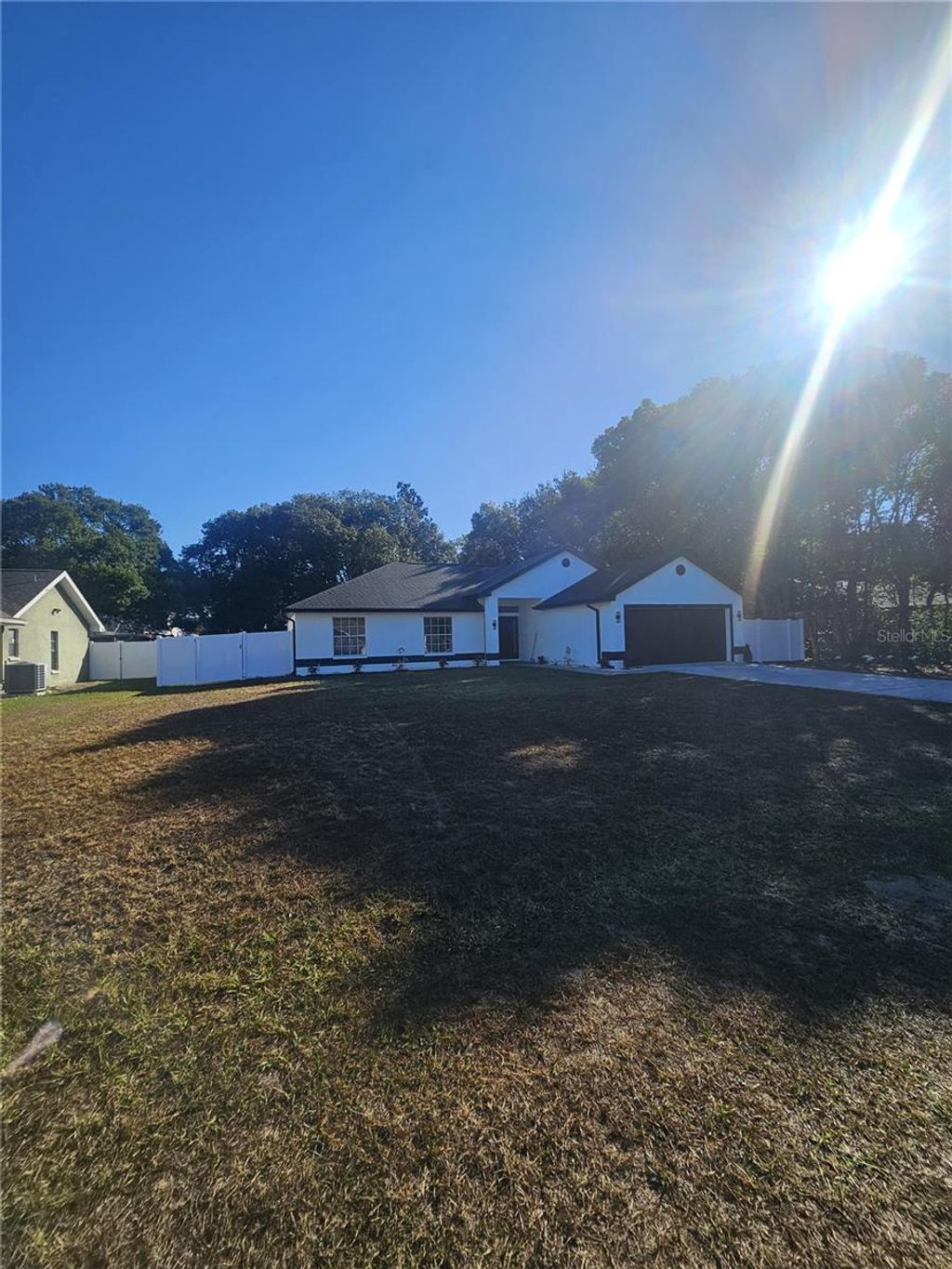 Photo of 3180 Wiltshire Avenue, Spring Hill, FL 34608 (MLS # TB8448211)