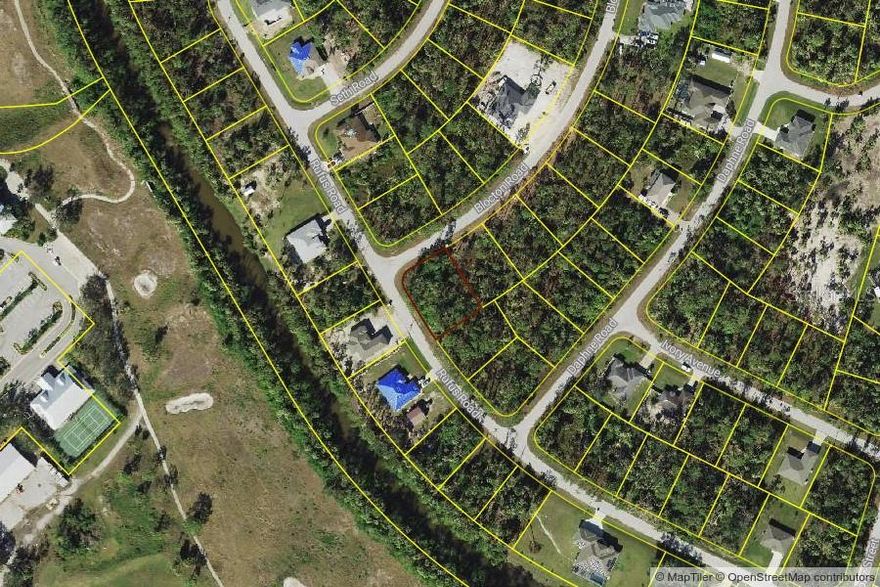 Beautiful oversized corner lot waiting for you to build your dream home in the thriving city of North Port, home of the Atlanta Braves Spring Training. Minutes to the North Port Aquatic Center, the water park that features a 25-meter stretch pool, three slides, and a lazy river. Centrally located to EVERYTHING...US-41, I-75, schools, Suncoast Technical College, Shannon Staub Library, and plenty of grocery & retail shopping, and dining. Close to Venice, Port Charlotte & Punta Gorda. Convenient access to a multitude of golf courses, world-class fishing, boating, and stunning Gulf beaches!