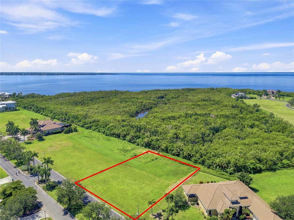 Photo of 21361 Harborside Boulevard, Port Charlotte, FL 33952 (MLS # TB8538697)