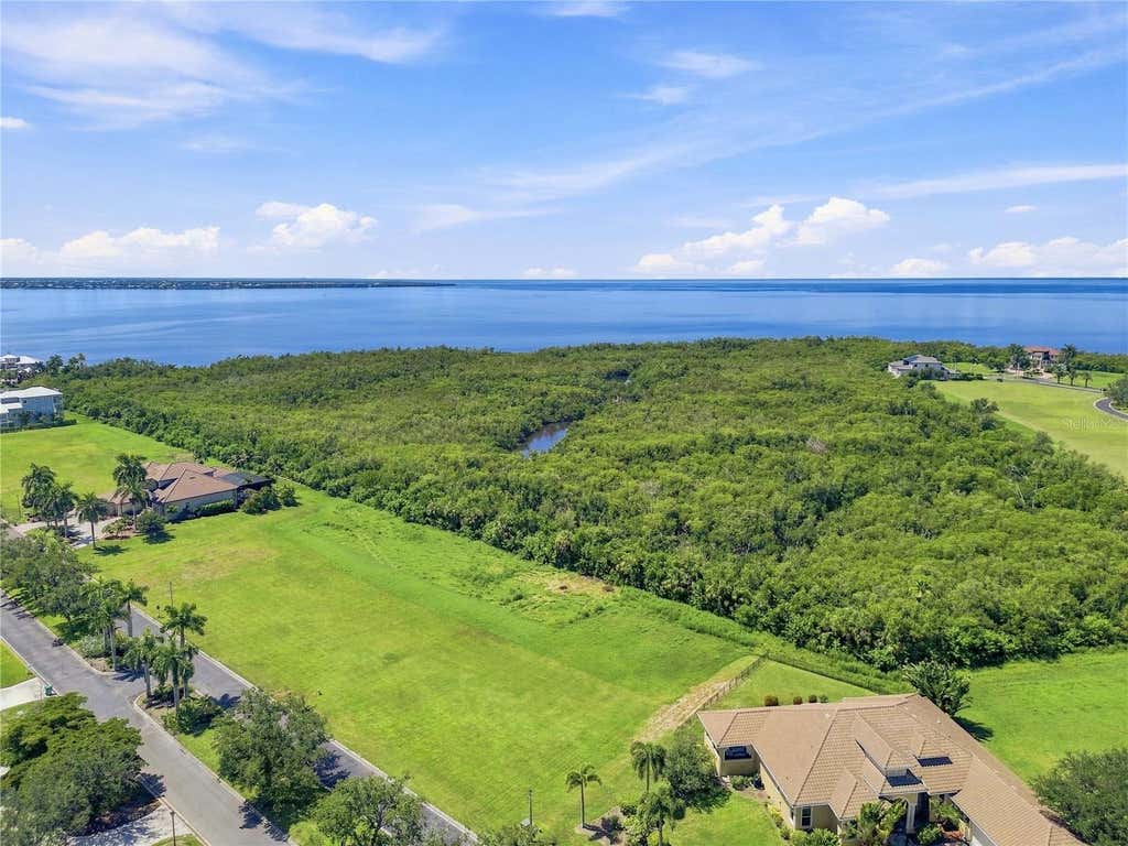 Photo of 21361 Harborside Boulevard, Port Charlotte, FL 33952 (MLS # TB8538697)
