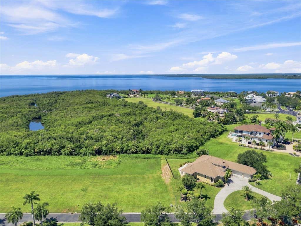 Photo of 21361 Harborside Boulevard, Port Charlotte, FL 33952 (MLS # TB8538697)