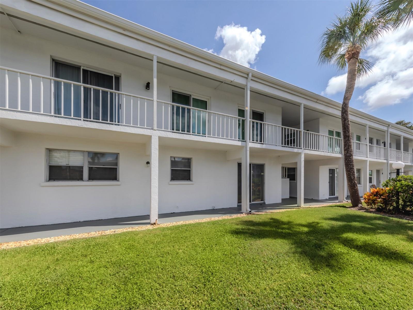 This Venice Island retreat presents a dream come true for those who envision paradise. Ideally in the Bahia Vista Gulf community, this two-bedroom, two-bath first-floor condominium harmonizes waterfront living with luxurious amenities. The interior has undergone extensive renovation featuring a well thought out floor plan replete with beautiful finishes. Bathed in natural light, the living room features sliding new hurricane impact doors that overlook the canal and boat slips. Fit for a chef, the kitchen features solid countertops, fresh white cabinetry and new stainless steel appliances. Luxury vinyl flooring, a crisp coat of paint and remodeled baths with new vanities, tiled showers, mirrors and fixtures complete the upscale design. Offered turnkey furnished, this move-in ready home is ideal as a seasonal escape, a full-time getaway or a rental property with income potential. For sun seekers, the community offers private beach access to the Gulf of Mexico, as well as a pool area for tranquil rest and relaxation. The boating enthusiast will appreciate the boat slips, which are available on a first-come, first-served basis. Unit 171 is ideally located just steps from your assigned parking space to your brand new impact door. In addition, each residence comes with a storage unit and ample guest parking. With proximity to dining, shopping, the Venice Jetty and the esteemed Venice Yacht Club, your tropical bliss awaits in Bahia Vista Gulf.