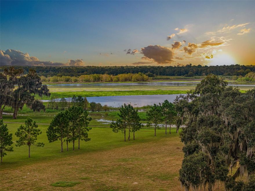 Nestled in the rolling hills of Brooksville, The Glory Ranch is a breathtaking 28.1-acre vacant tract of land on the highly sought-after Mondon Hill Road. This exceptional property boasts dramatic elevation changes, high and dry homesites, and panoramic sunset views over Byster Lake, making it the perfect canvas for your dream estate, equestrian retreat, or working ranch. Currently an income-producing hay field, The Glory Ranch offers rich soil and fertile pastures—a haven for grazing animals and agricultural pursuits. Majestic grandfather oaks provide both beauty and shade, while a meandering creek attracts native birds and wildlife, adding to the serene natural ambiance. Conveniently located just minutes from I-75, historic downtown Brooksville, and the Gulf of Mexico, this prime piece of land offers the perfect balance of seclusion and accessibility. Whether you're looking to build, farm, or invest, The Glory Ranch is where dreams take root.