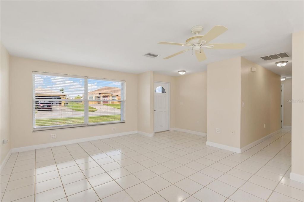 Photo of 703 Spring Lake Boulevard NW, Port Charlotte, FL 33952 (MLS # C7515906)