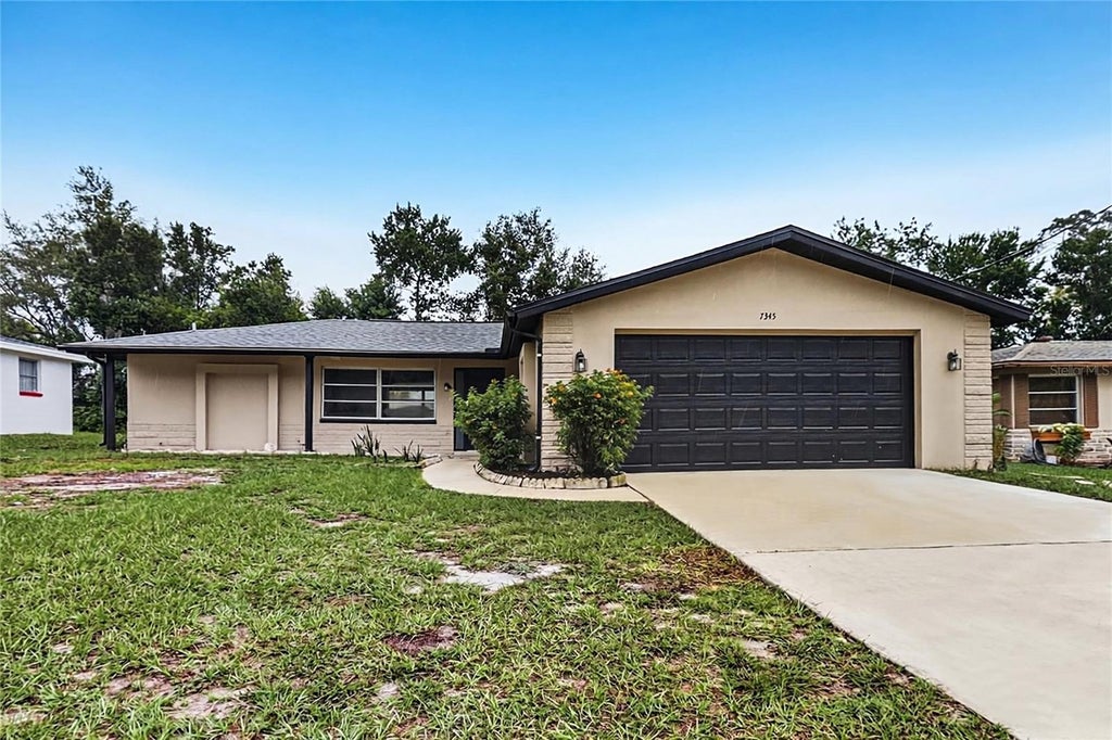Photo of 7345 Apache Trail, Spring Hill, FL 34606 (MLS # TB8556111)