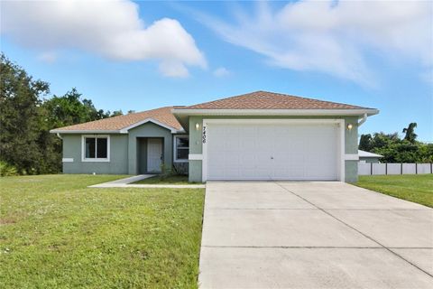Photo of 7406 Watson Lane, Port Charlotte, FL 33981 (MLS # TB8436555)