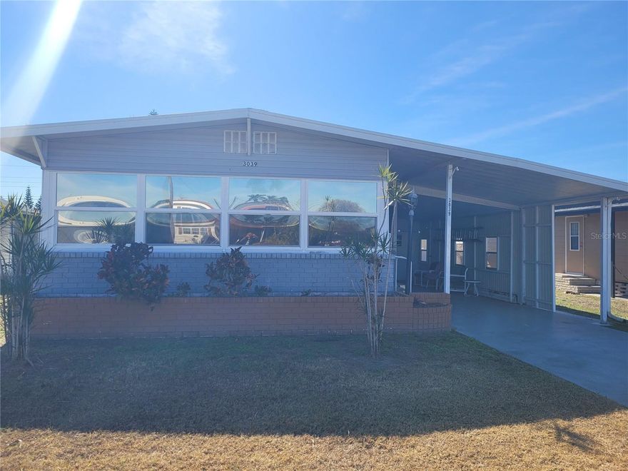 You'll love this lovely spacious move-in ready, furnished 2 bedroom, 2 bath home in a friendly, active, gated 55+ community in SE Lakeland. All the furniture, tools, kitchen, and household items convey with the home. stay in this friendly, active, gated 55+ community. Remodel was complete two years ago including a new air conditioner, new electrical panel, and a whole house replumb. The kitchen has been remodeled including wood cabinets, remodeled bathrooms and large walk in closets providing plenty of storage. Skyview Estates has a private fishing pier on Blue Lake so bring your rod and bait and take a short walk or a ride on your golf cart to the private lakeside community park and fishing pier for a morning or evening of quiet and relaxing fishing, or enjoyable some quality time with friends around the firepit for morning coffee and doughnuts or an evening around the fire relaxing with friends. . The large recreational building has a full kitchen for the many fun community activities where you'll meet all your neighbors and make new friends. You own the land – no lot rent – HOA fee is only $400 a YEAR!