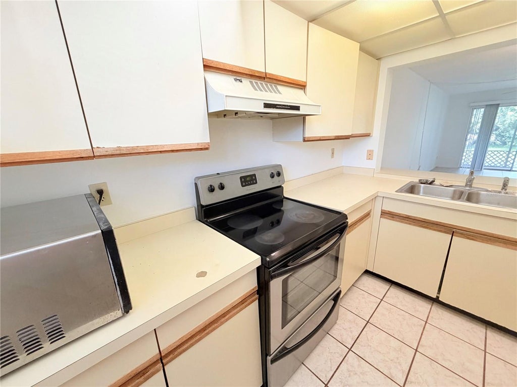 Photo of 8151 Heatherwood Drive #111, Seminole, FL 33777 (MLS # TB8559956)