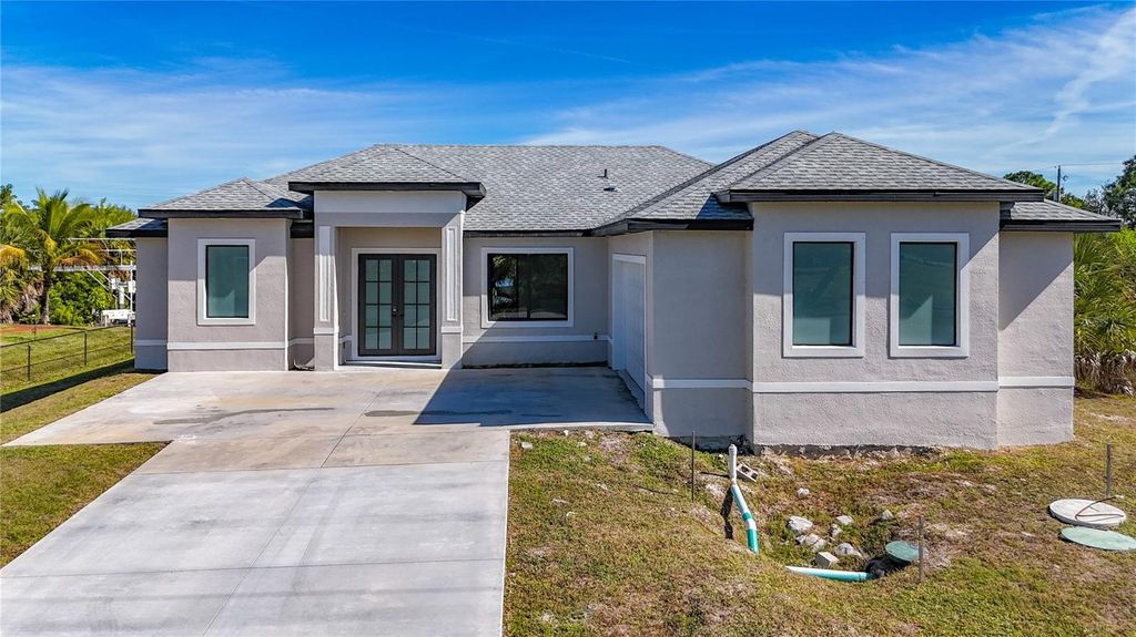 Photo of 10404 Monticello Drive, Port Charlotte, FL 33981 (MLS # A4675441)