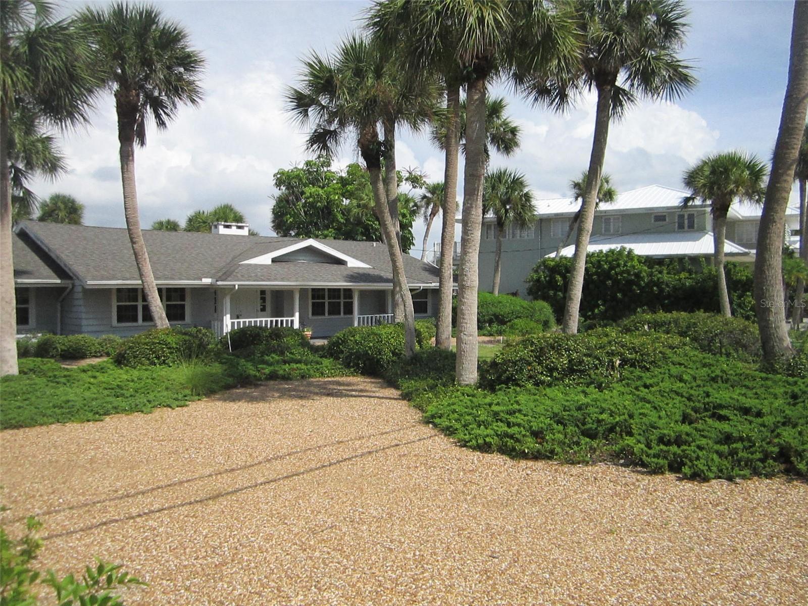 LOCATION, LOCATION, LOCATION!!!! Lovely Casey Key ranch style home to is available to rent. Bay side home has plenty of space to spread out and enjoy Florida living at its finest. The home has four bedrooms, four bathrooms, living room, great room, large dining room with two tables, functional kitchen with breakfast dining space and much, much more. The primary bedroom has a king sized bed, walk in closet and ensuite bathroom with soaking tub that looks out to the bay, double sinks and a stall shower. The first guest bedroom has a queen sized bed, walk in closet and ensuite bathroom with a tub/shower combination. Second guest bedroom has a queen sized bed. The third guest bedroom has two twin sized beds and an on suite bathroom with a stall shower. The fourth bathroom has a walk in shower. The home has brand new flooring throughout and all the bathrooms have been remodeled. The expansive lanai has wide views across the bay, multiple seating areas, a private pool and dock for watching the birds, boats and other sea life. The home has a two car garage with one space available for a guest. Ready to rent with all the amenities needed for a carefree stay. Call today for availability. This will not last long!!!!!
