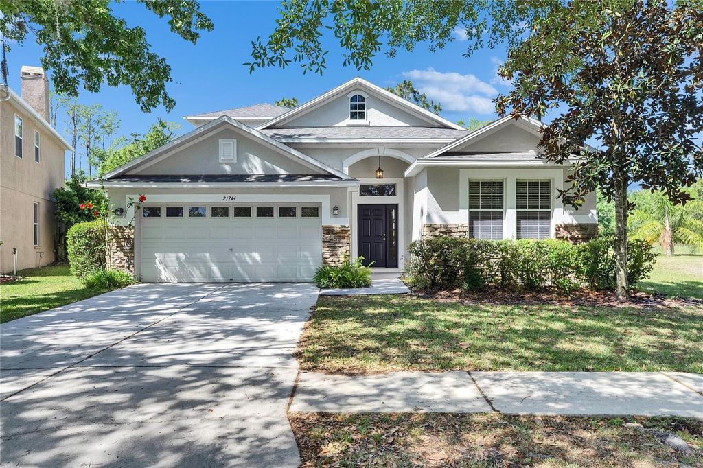 Photo of 21744 Waverly Shores Lane, Land O Lakes, FL 34637 (MLS # TB8369302)