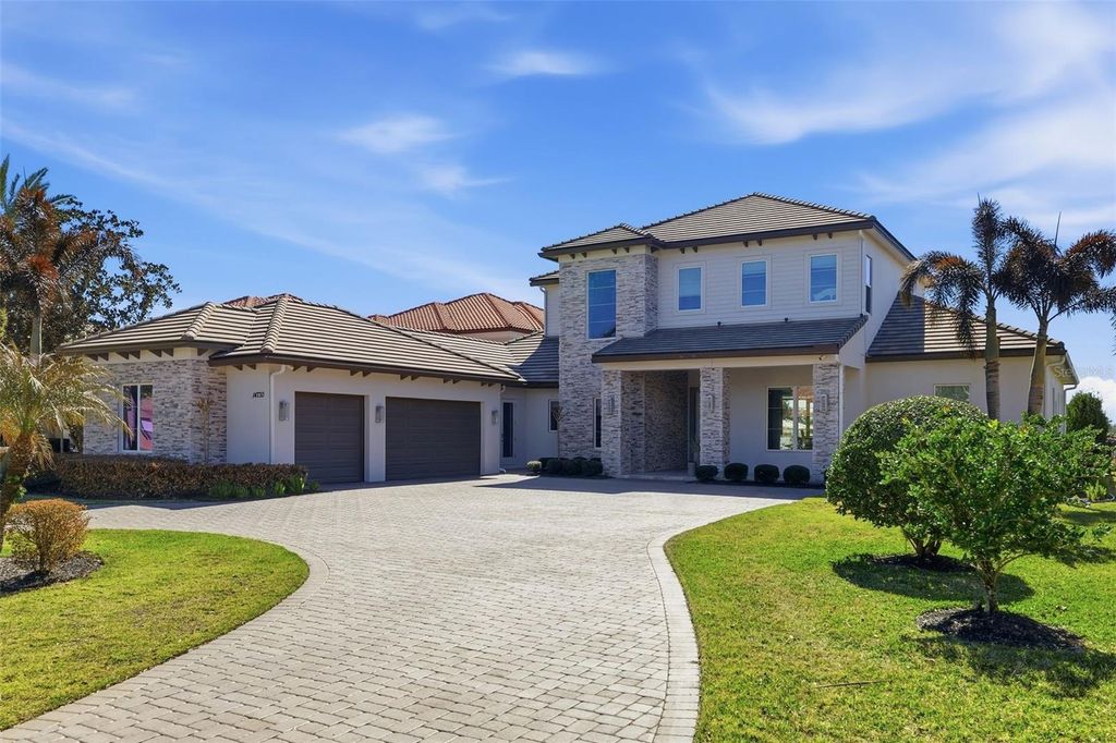 Photo of 14730 Avenue Of The Rushes, Winter Garden, FL 34787 (MLS # TB8470998)