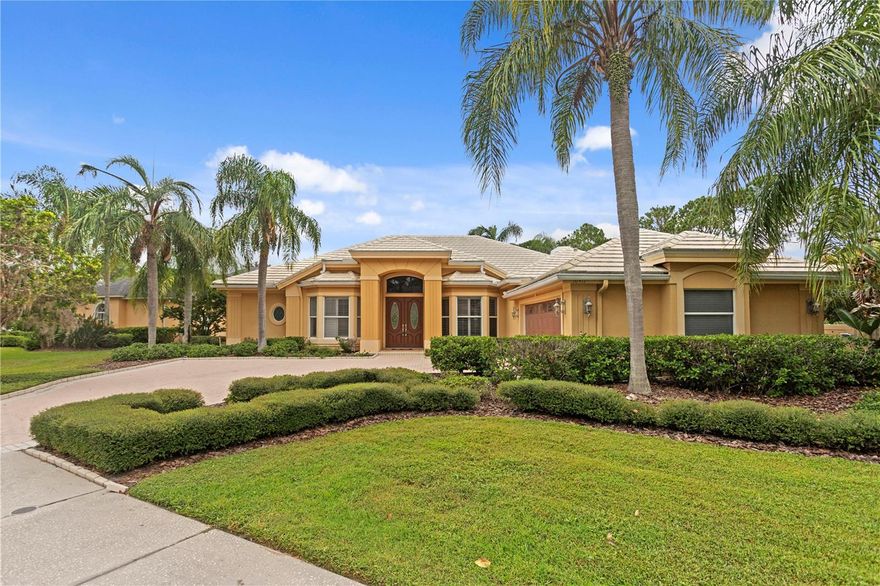 Experience the pinnacle of luxury living in the exclusive gated enclave of Cory Lake Isles, where this move-in-ready masterpiece awaits discerning buyers. This exquisite 4-bedroom, 3.5-bathroom residence spans 2,891 square feet of meticulously designed living space, ensuring both family-friendly comfort and elegant entertaining. As you enter through the private, French-style double doors, you're greeted by an ambiance of elegance highlighted by a light lavender hue and light-color ceramic tiles laid in a grid pattern. The separate formal dining area, illuminated by a striking Modern Gold Orb Chandelier, provides a perfect backdrop for unforgettable gatherings. Adjacent, the glamorous living area, featuring a built-in ceiling fan, invites relaxation and offers seamless access to a backyard oasis. The chef-inspired kitchen is a culinary dream come true, boasting granite wrap-around countertops, built-in masonry wood cabinetry, and state-of-the-art stainless steel appliances, including a dishwasher, built-in range with range hood, overhead microwave, double-door refrigerator, and built-in double oven. The spacious family room is designed for comfort, featuring a cozy fireplace, high ceilings, double built-in ceiling fans, and built-in shelving, creating an inviting atmosphere. Sunlight filters through plantation shutters adorning standard and arched windows, casting a warm glow across the high ceilings. Retreat to the primary bedroom suite, a luxurious haven with an ensuite bathroom that offers double vanity sinks, a large mirror, an expansive shower stall with a transparent glass door, a built-in rain shower head, a handheld shower, and a convenient shower bench. Three additional bedrooms and two and a half bathrooms provide ample accommodations for family and guests. Step outside to a spacious screened porch that leads to a pool and spa, epitomizing relaxation, and further access your private backyard oasis, complete with a screened octagonal gazebo featuring a built-in ceiling fan and access to a wooden dock. The home is completed with a 2-car garage featuring a brick paver driveway. Perfectly situated in a prime location, this residence seamlessly blends luxurious living with modern amenities, making it the ideal choice for those seeking a serene yet connected lifestyle. Schedule your private viewing today to experience the unparalleled charm of this exceptional property.