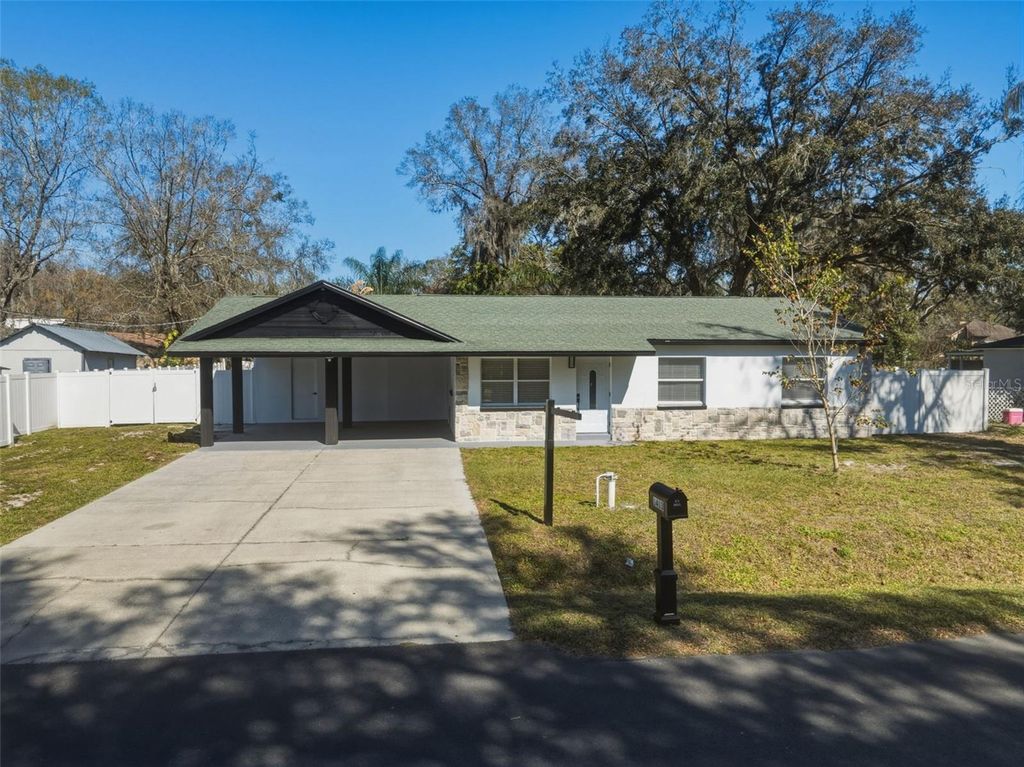 Photo of 1413 May Street, Lutz, FL 33548 (MLS # TB8481628)
