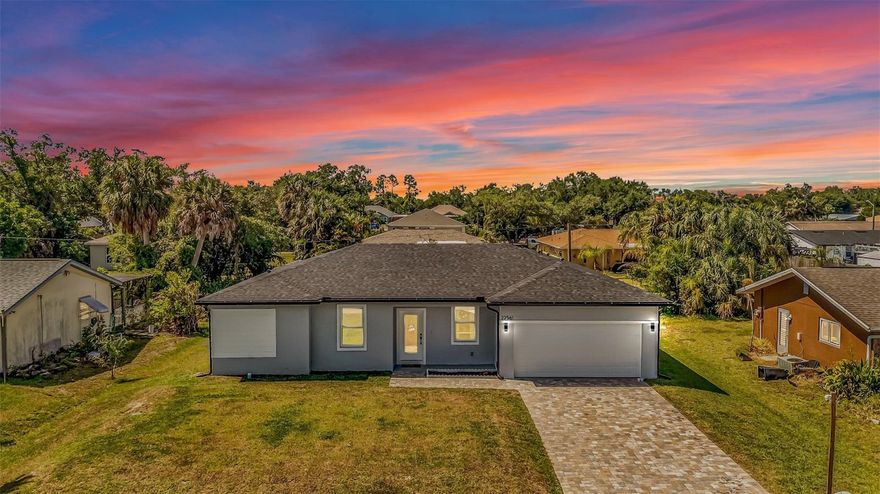 Welcome to 22561 Alcorn Avenue in the heart of Port Charlotte, a brand-new construction opportunity perfect for both investors and future homeowners seeking modern living in one of Southwest Florida’s growing markets. This beautifully designed 4-bedroom, 2-bath residence offers 1,636 sq ft of living space (2,079 total sq ft) with a bright open-concept layout, soaring ceilings, luxury-style finishes, and a contemporary design that stands out from the moment you walk in.
The spacious kitchen was thoughtfully designed for both style and functionality, featuring quartz countertops, a large center island with modern fluted detailing, stainless steel appliances, sleek black fixtures, and seamless flow into the dining and living areas creating the ideal space for entertaining or everyday living. The split-bedroom floor plan provides privacy and comfort, while the neutral modern finishes make this property truly move-in ready.

Conveniently located near shopping, restaurants, schools, medical facilities, parks, boating access, and the beautiful Gulf Coast beaches, residents enjoy easy access to everything Port Charlotte has to offer. Nearby attractions include Port Charlotte Beach Park, waterfront recreation, golf courses, and quick access to Punta Gorda, North Port, and surrounding coastal destinations.

For investors, this property presents an exceptional opportunity as it already has a tenant in place, allowing for immediate rental income from day one with no vacancy downtime.