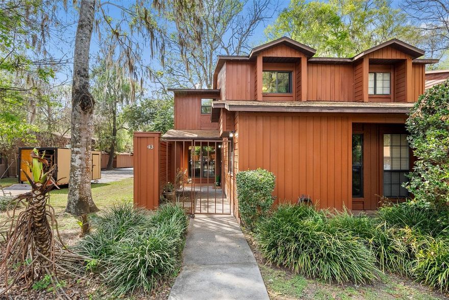 Fully renovated 3BR/3BA end-unit in Rockwood Villas near Butler Plaza and Oaks Mall, with direct access to the University of Florida and Santa Fe College bus route. Key features include a REMODELED KITCHEN with NEWER Appliances, Marble/Quartz countertops, and 3 ensuite bedroomswith updated baths. Major upgrades: NEW FLOORING (no carpet), ALL WINDOWS REPLACED, four-season enclosed patio (heated/cooled), FRESH INTERIOR PAINT (2026), new lighting, and updated closets/doors. Exterior improvements include a new front walk, refreshed landscaping, and added outdoor functionality. WASHER/DRYER INCLUDED. Enjoy maintenance-free living with HOA covering exterior, pest control, and trash, plus access to two pools and a tennis court. Transferable 3-year Choice Home Warranty included. Move-in ready with strong investment or primary home appeal.