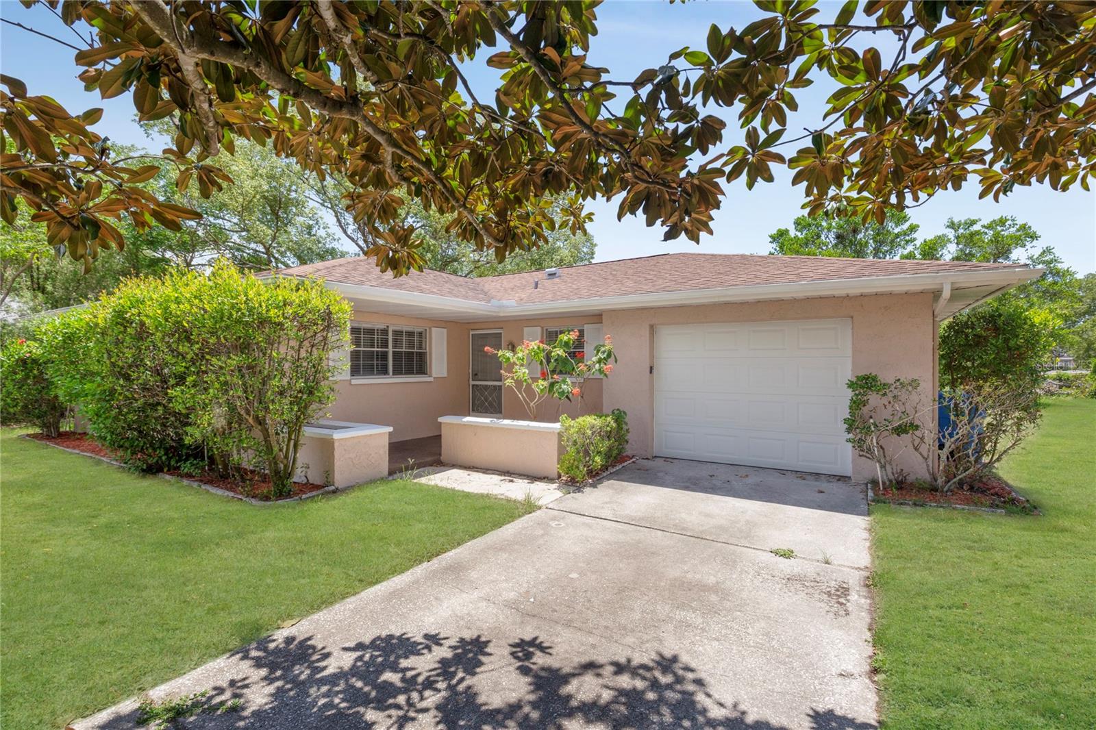 Positioned on a 0.26-acre lot in Spring Hill, this home offers a straightforward open floorplan with a connected living and dining area, plus a bonus room that can serve as a home office, playroom, or additional living space. The kitchen includes stainless steel appliances and opens directly to the dining area for efficient daily use. The large lot allows room for outdoor projects or future improvements. With no HOA, owners have the flexibility to manage and personalize the space to suit their needs. Conveniently located just 5 minutes from grocery stores and everyday services, the property is also 10 minutes from Veterans Memorial Park and 15 minutes from Weeki Wachee Springs State Park. The Veterans Expressway (SR 589) is a 10-minute drive, providing direct access to the Tampa Bay area.
