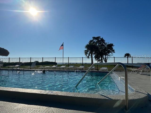 Updated 2 bedroom, 2 full bath second floor condo is set within the gulf side Windrush Bay condo community. The pool and clubhouse for the association are located directly on the edge of the Gulf with amazing views of both Sunset Beach and Fred Howard Park, beach & causeway. The association has a private grassy area within the seawall which provides a space for residents to enjoy the sunsets and fishing. Primary bedroom can accommodate a king bed, offers a Walk-in closet, & patio doors out to the enclosed lanai. Open air balcony at the front of the condo. Double closets in the 2nd bedroom comfortably fits a queen bed. Kitchen & bathrooms have been updated with luxury vinyl plank. Photos are shown with furniture, however the condo will be available Sept 15th as an UNfurnished long-term rental. HOA requires a minimum of 3 month lease, however owner prefers a long-term arrangement. In unit laundry and kitchen appliances included. Storage closet located in the enclosed lanai. 1.8 miles from the Pinellas Trail, 0.5 miles to Sunset Beach, and 2 miles to the end of the Fred Howard Causeway/Beach. Owner is licensed realtor in FL. $150 application fee to the HOA for background check. Owner is licensed agent in FL.