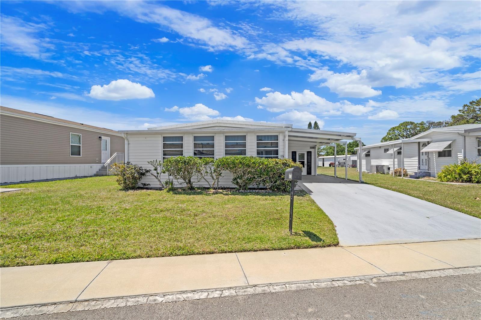 Welcome to your new home in the sought after 55+community of Port Malabar Holiday Park-a secure, 24 hr gated community in beautiful Palm Bay, Florida, just minutes from the Space Coast's top attractions. This double wide mobile home features 2 spacious bedrooms, and 2 full baths, plus an enclosed bonus room under air-perfect for a home office, hobby room, or relaxing sunroom. This home comes fully furnished and move in ready. It is clean, tidy, and well maintained with lots of closet space. It has a carport and a utility room with a washer/dryer. Enjoy resort style amenities: 2 community pools (one heated), clubhouse with Bingo, ice cream socials, and many group activities. Cable and internet included. This residence is close to fishing spots, nature trails, and family friendly attractions. Whether you're retiring, relocating, or looking for a snowbird escape, this home offers comfort, community, and convenience in a sunny Florida setting. Don't miss your chance to own a piece of paradise in Palm Bay. All information is deemed reliable, but not guaranteed. Check the property appraiser website for further information.