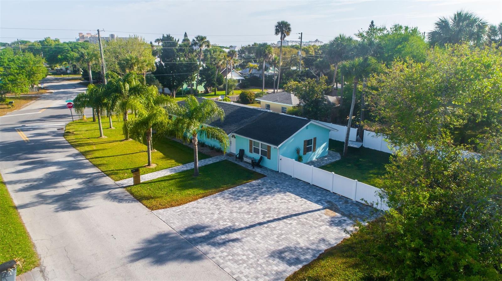 This recently updated family home is sure to please for your next beach vacation! Only four blocks from the heart of Flagler Avenue and a short walk to the beach, this home is perfect for a family getaway! With three bedrooms and three full bathrooms, everyone has plenty of space. Enjoy your morning coffee on the back patio or relax in the hammock after a day at the beach. The spacious Main Suite is right off the living room with a king-size bed and en suite bathroom with a beautiful walk-in shower. The second bedroom has a Queen-sized bed with a private bathroom, and the third has bunk beds with two full-size beds. There is another full-sized bathroom right off the third bedroom with a shower/tub combo. The additional living area off the kitchen can double as a great "work from home" space if needed! Come live like a local and settle into this sweet spot so you can enjoy all the best that NSB has to give! Trust us; visit once, and you'll be back!