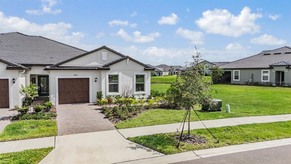 Photo of 10935 Gable Dig Loop, San Antonio, FL 33576 (MLS # TB8435207)