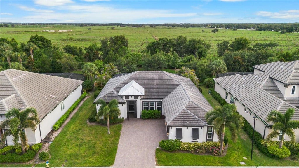 Photo of 6325 Rivo Lakes Boulevard, Sarasota, FL 34241 (MLS # A4696525)