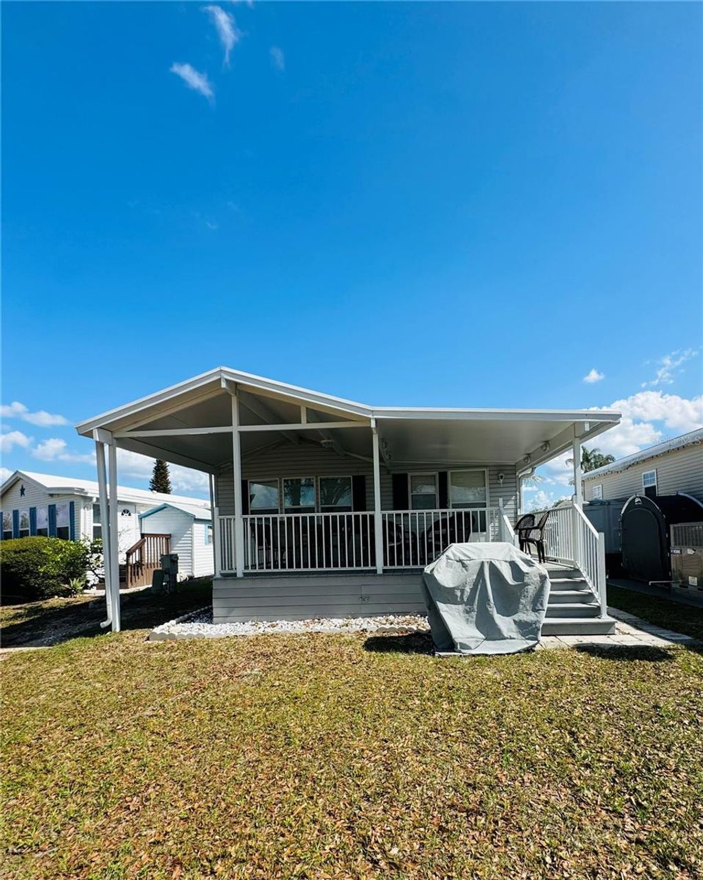 Photo of 627 Arnold Palmer Drive, Davenport, FL 33837 (MLS # O6389451)