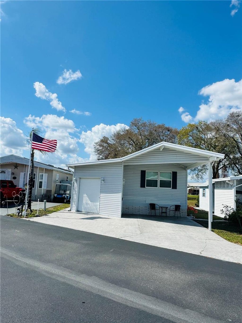 Photo of 627 Arnold Palmer Drive, Davenport, FL 33837 (MLS # O6389451)