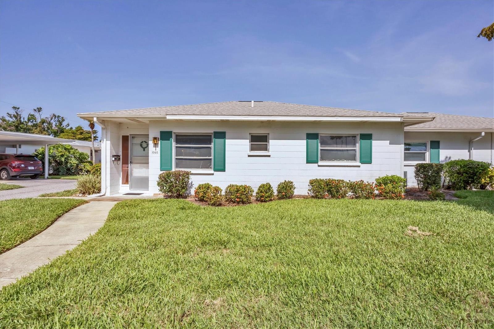 ***VENICE ISLAND*** This Sunny Updated End-Unit is in the Beach Manor Villas, an active 55+ Maintenance Free Community with a resort-style year-round heated swimming pool. The gourmet Kitchen has wood cabinets, granite countertops and newer appliances with a pass-through to the Sunroom. This amazing home includes (2) spacious Bedrooms,1.5 Bathrooms, Laundry Room with washer/dryer hook-ups, plus a Private Covered Carport and a large brick paver Patio. Quiet location and there are no shared walls with other units.
Every day is a holiday at this friendly island community. Make new friends while lounging at the pool or relax watching the breathtaking sunsets from your patio. It’s only a short walk to the public beach where you can enjoy a delicious meal at the famous Sharky’s Restaurant overlooking the Venice Fishing Pier. Close to Historic Downtown Venice shopping with amazing boutiques and restaurants, Venice Theater, Venice Airport, the Fairgrounds and the Venice Lake 18-hole golf course. Outdoor enthusiasts can experience boating and shelling excursions or a vigorous walk or bike ride along the Legacy Trail. It is always exciting to explore the extraordinary Venice Island.
HOA fees includes professional management, property insurance, water, sewer, trash, cable TV, lawn service, pest control, exterior maintenance and a heated swimming pool with clubhouse.